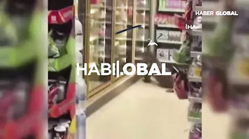 Marketə nəhəng kərtənkələ girdi