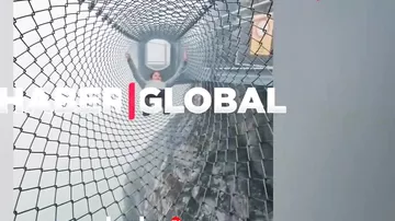Çində sıldırım qayalıqda video çəkmək istəyən turist peşman oldu