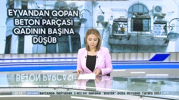 Eyvandan qopan beton parçası qadının başına düşüb