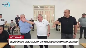 Gürcüstanda azərbaycanlı deputat seçiciyə çaynik atdı