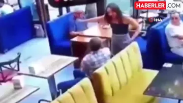 Paytaxtda qadın ofisiant ona şillə vuran müştərini təpikləyib kafedən belə çıxardı