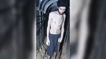 HƏMAS israilli girova öz məzarını qazdırdı
