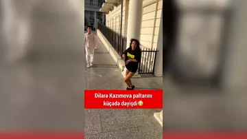 Azərbaycanlı müğənni küçədə hər kəsin göz önündə paltarını DƏYİŞDİ