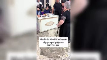 Xalq artistini "pul yağışı"na tutdular