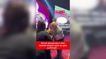 Xalq artsitinin əlini öpmək istədi az qala yıxılacaqdı