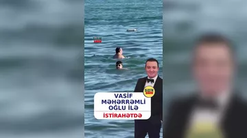 Vasif Məhərrəmli oğlu ilə çimərlikdə görüntüləndi
