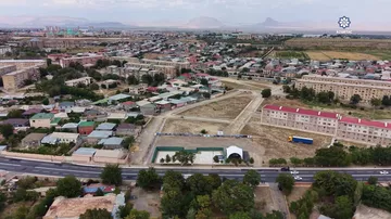 Prezident İlham Əliyev Naxçıvan şəhərində sosial evlər kompleksinin təməlini qoyub