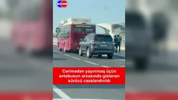 Cərimədən yayınmaq üçün avtobusun arxasında gizləndi