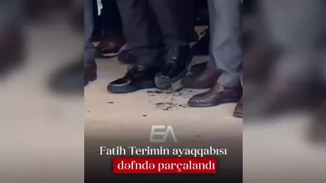 Fatih Terimin ayaqqabısı dəfndə parçalandı