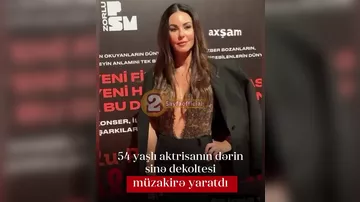 54 yaşlı Defne Samyelinin dərin sinə dekoltesi müzakirə yaratdı