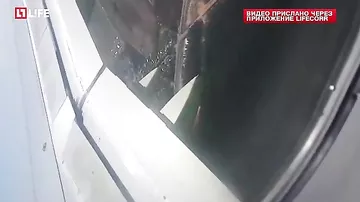 Иркутск Видео из салона самолета, севшего из-за пожара в двигателе