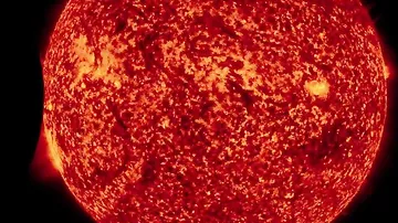 НАСА показало транзит Луны по диску Солнца