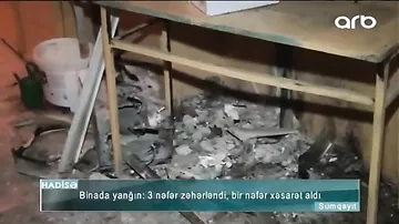 "Tüstüdən boğulurduq" - Sumqayıtda bina yandı