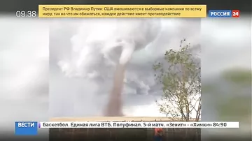 Канадец не бросил стричь газон при виде торнадо