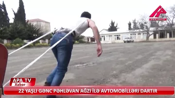 22-летний азербайджанец тащит зубами автомобиль