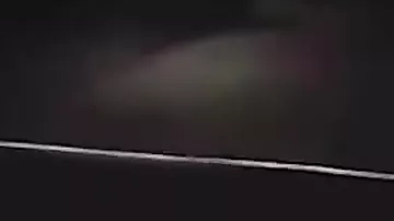 Водитель снял на видео преследующий его призрак женщины на дороге
