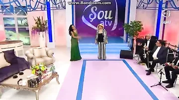 Manaf Ağayevin efirə geyindiyi paltarı görən qadın aparıcı GÜLDÜ