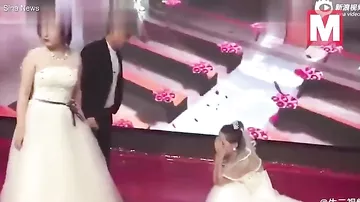 Бывшая девушка китайца заявилась на свадьбу в белом платье и устроила скандал