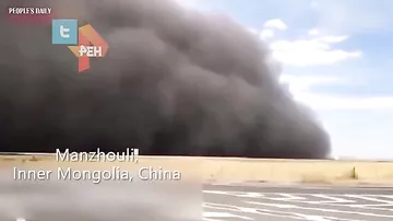 Под куполом: сильнейшая пыльная буря накрыла район Китая