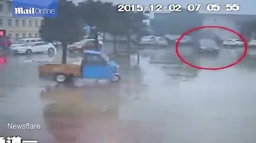 Shocking Video Two Chinese Toddlers are Run Over by a Car in front of their Kindergarten in Guangde